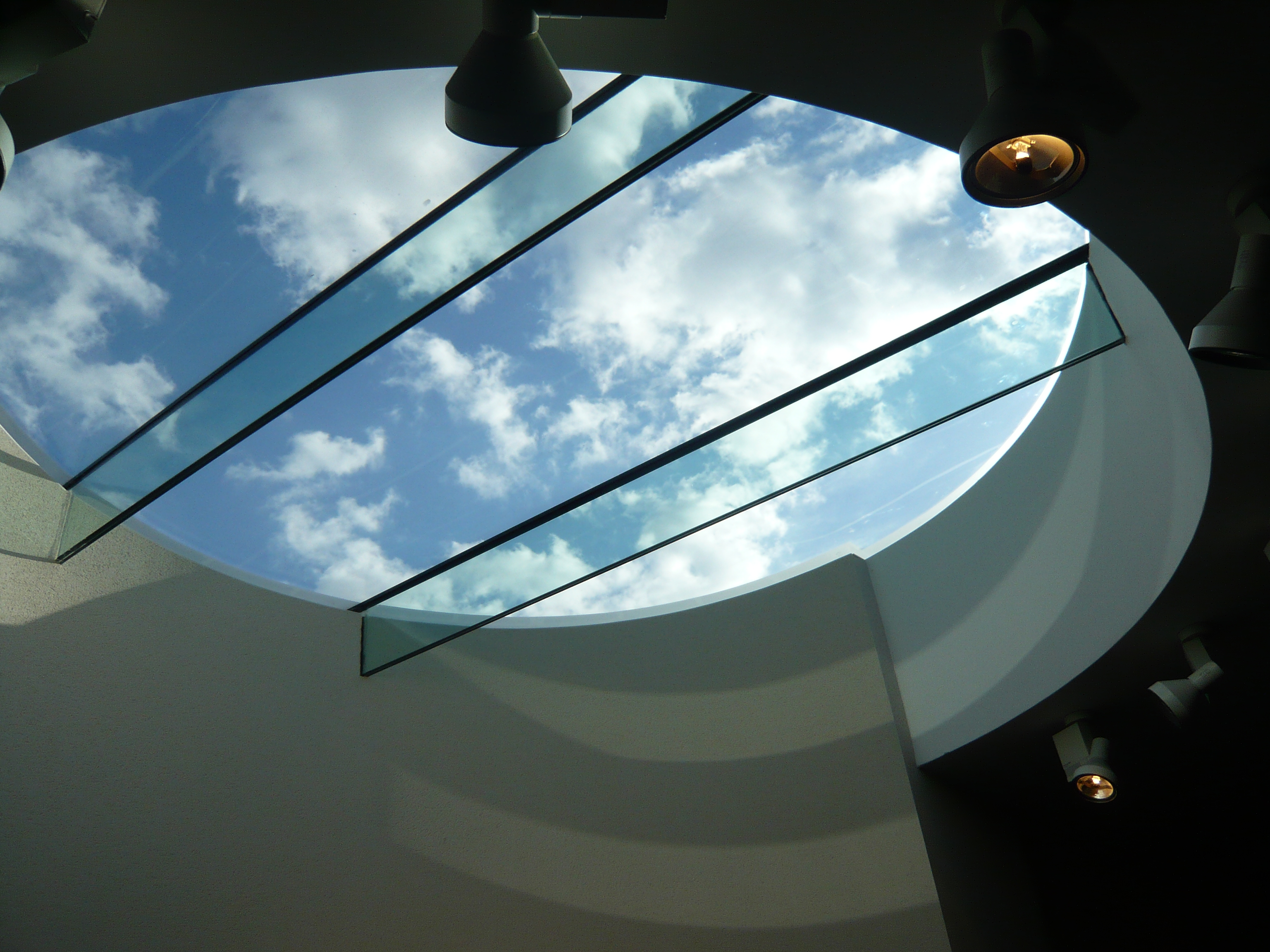 Circular rooflight with glazed bars in a private art gallery new build
