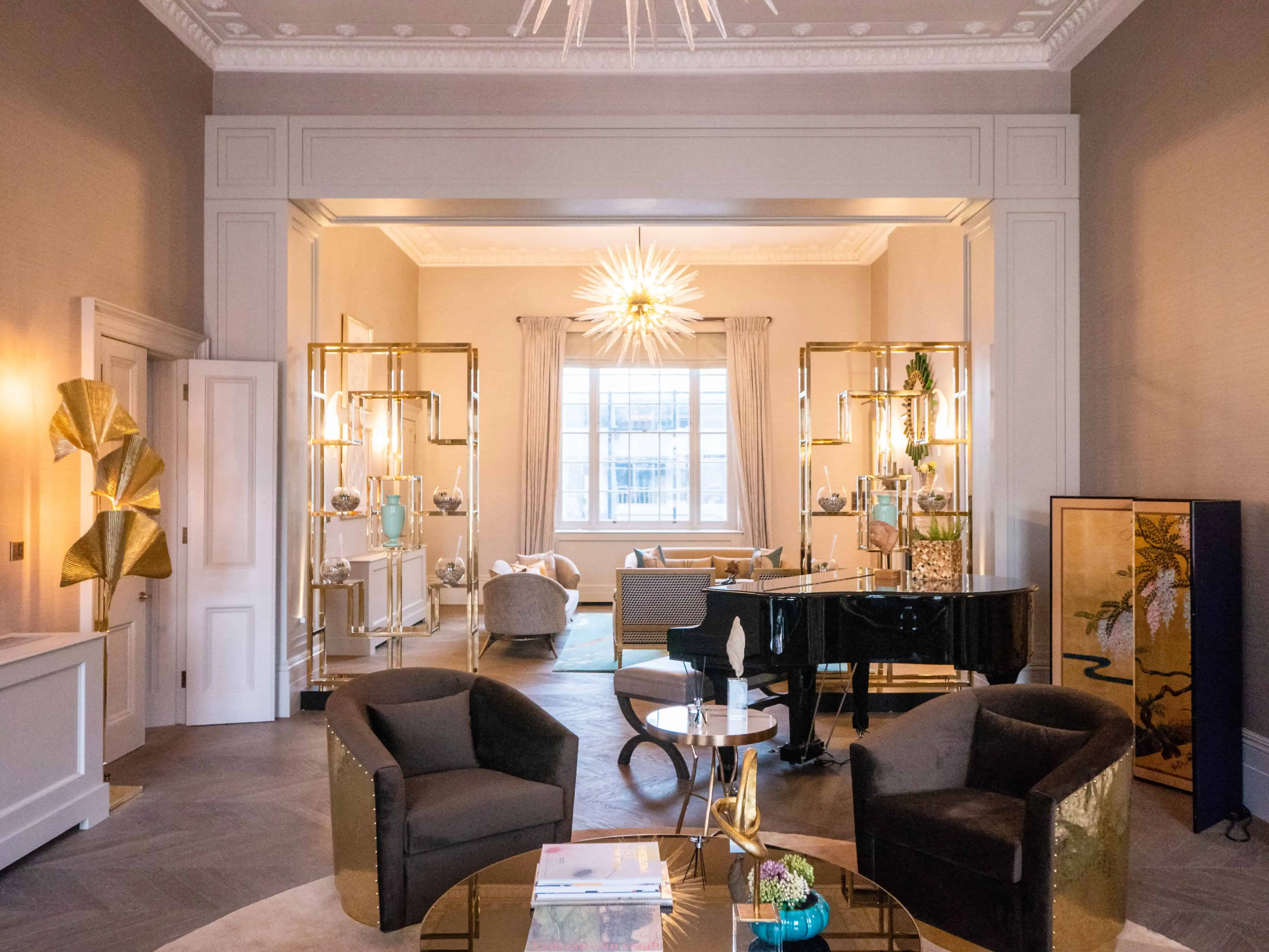 Classic-meets-modern sitting room with high ceilings and timeless detailing.