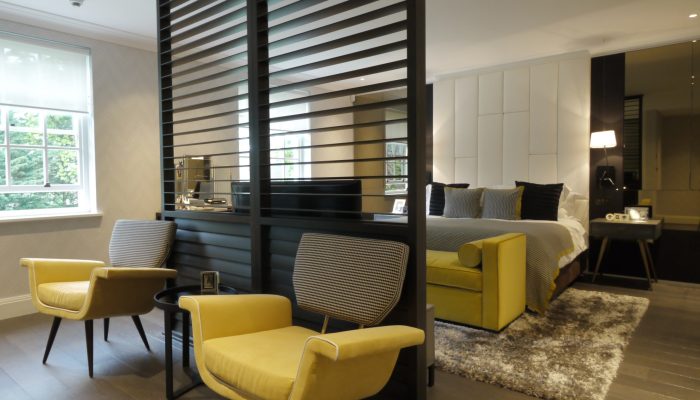 Bedroom with timber slatted partition in a Hampstead Garden Suburb house extension